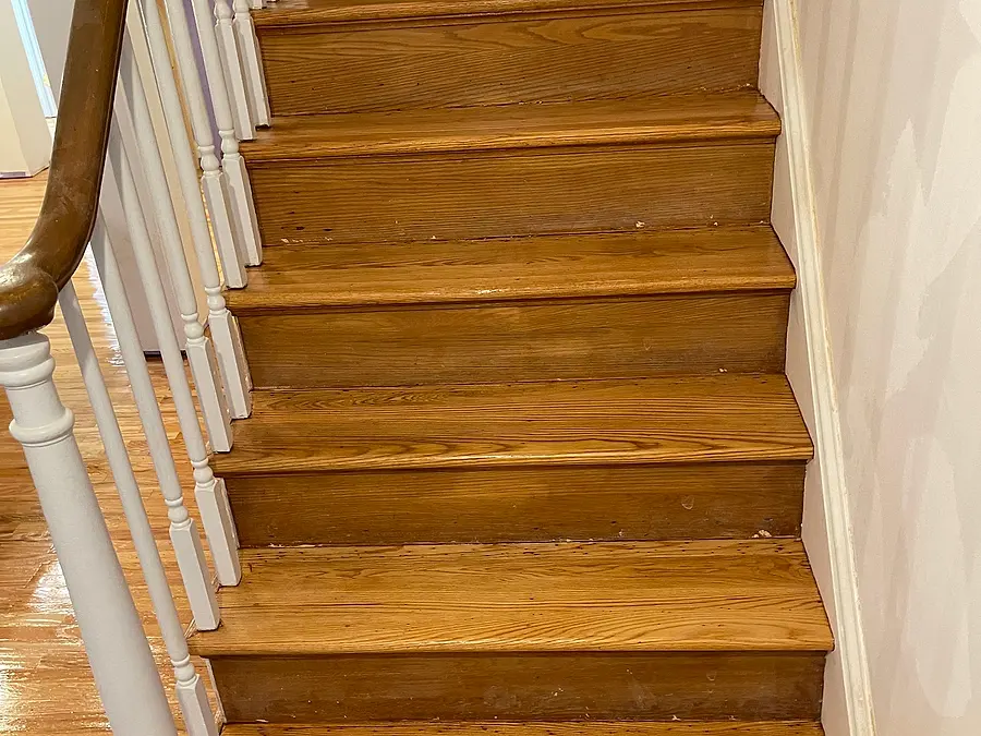 Refinished hardwood stairs with a natural finish